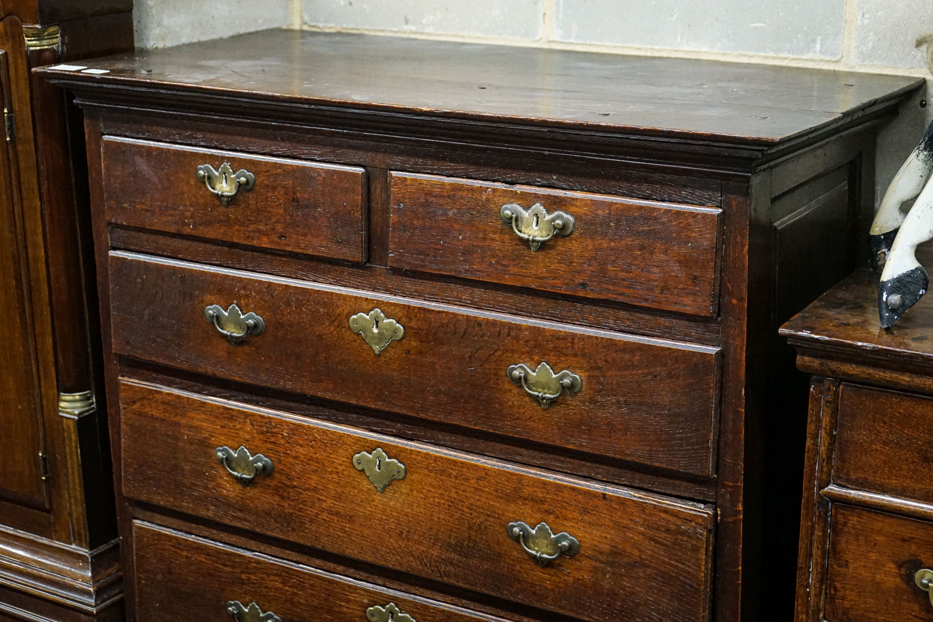 An early 19th century mahogany banded oak cased eight day longcase clock, height 227cm